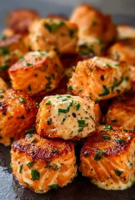 Delicious Bang Bang Salmon Bites served as an appetizer.