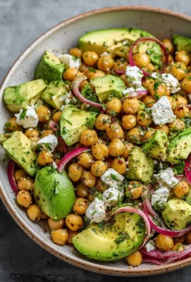 Chickpea Feta Avocado Salad with fresh ingredients in a bowl