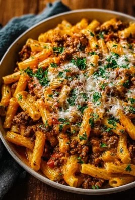 Creamy high protein beef pasta with fresh herbs and cheese