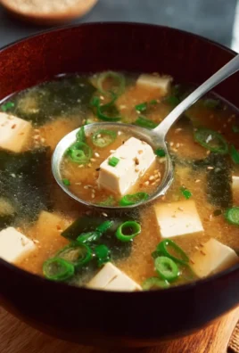 Bowl of easy gluten-free miso soup with green onions garnish