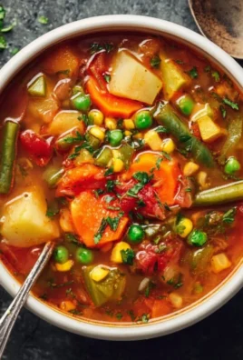 Bowl of easy vegetable soup with fresh ingredients and vibrant colors