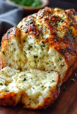 Freshly baked Italian Herb and Cheese Bread with herbs and cheese