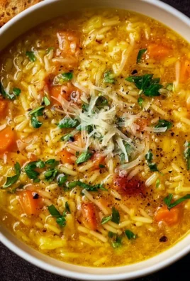 Bowl of homemade Italian Penicillin Soup with fresh herbs and vegetables