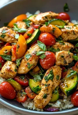 Mediterranean Chicken Stir-Fry with colorful vegetables in a skillet