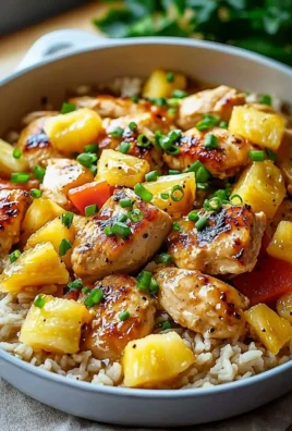 One-Pan Pineapple Chicken with rice served in a colorful dish