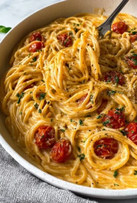 Delicious roasted tomato and garlic ricotta pasta served in a bowl