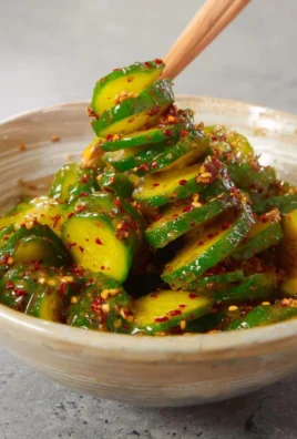 Korean-inspired spiral cucumber salad with vibrant colors and fresh ingredients