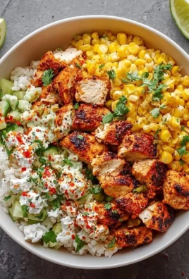Street Corn Chicken Rice Bowl with chicken, corn, and spices in a bowl