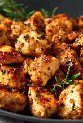 Succulent seasoned chicken breast morsels seared to perfection.