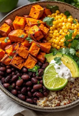 Vegan Sweet Potato Burrito Bowl with colorful ingredients and toppings