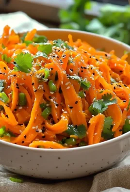 Colorful Asian Carrot Salad with sesame dressing and fresh herbs