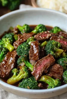 Delicious Beef and Broccoli Stir-Fry served in a bowl with chopsticks.