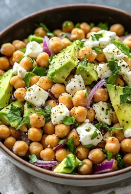 Chickpea Feta Avocado Salad with fresh vegetables and herbs