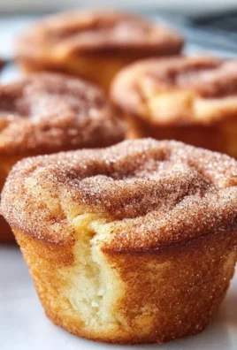 Delicious Cinnamon Sugar French Toast Muffins freshly baked and served.