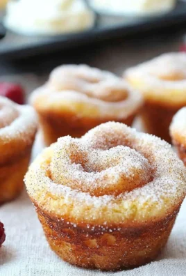 Batch of delicious Cinnamon Sugar French Toast Muffins fresh out of the oven.