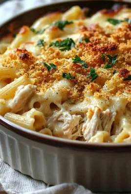Delicious chicken pasta casserole baked with creamy sauce and cheese.