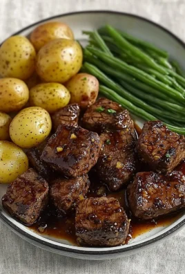 Delicious garlic balsamic steak bites served on a plate.