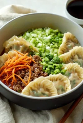 Homemade dumplings fresh out of the pot, ready to serve.