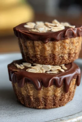 Moist peanut butter protein oatmeal cups arranged on a plate