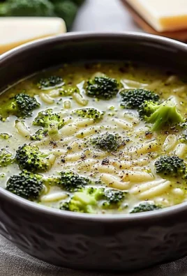 Bowl of warming Italian Broccoli Soup garnished with fresh herbs
