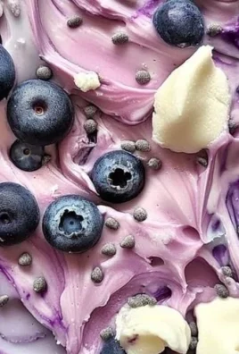 Blueberry yogurt bark topped with fresh blueberries and nuts