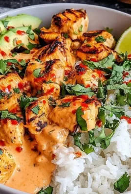 Delicious Coconut Chicken Rice Bowl with fresh ingredients and coconut flavor.