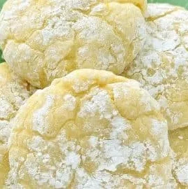 Coconut Key Lime Crinkle Cookies with a powdered sugar coating