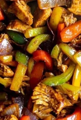 Delicious Easy Chicken Fajita Burrito Bowls with colorful vegetables and chicken.