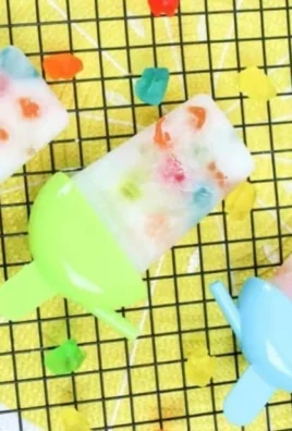 Refreshing fizzy summer popsicles in vibrant colors