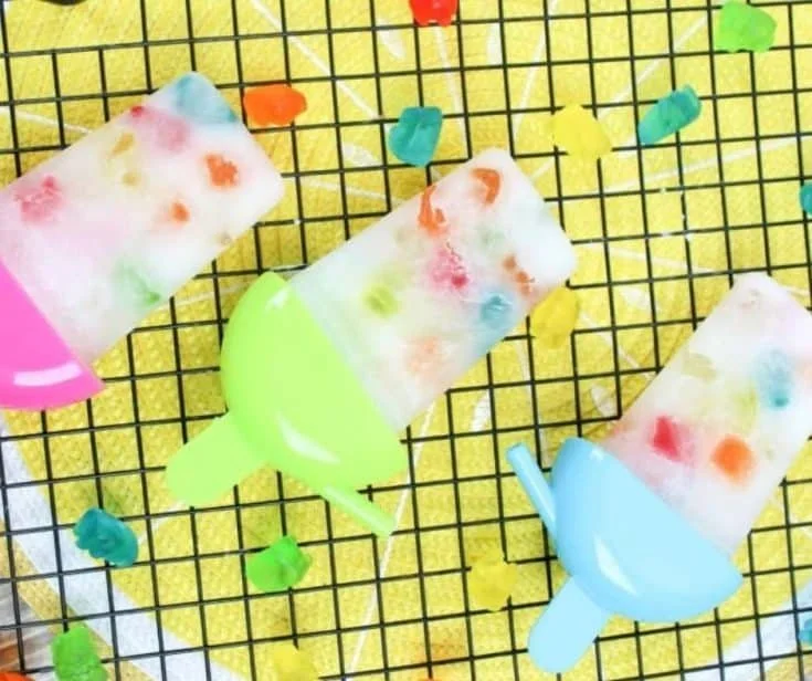Refreshing fizzy summer popsicles in vibrant colors