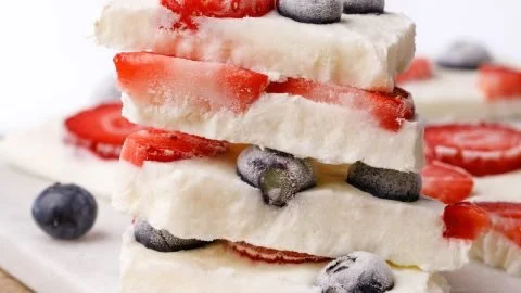 Delicious homemade frozen yogurt bark topped with fruits and nuts