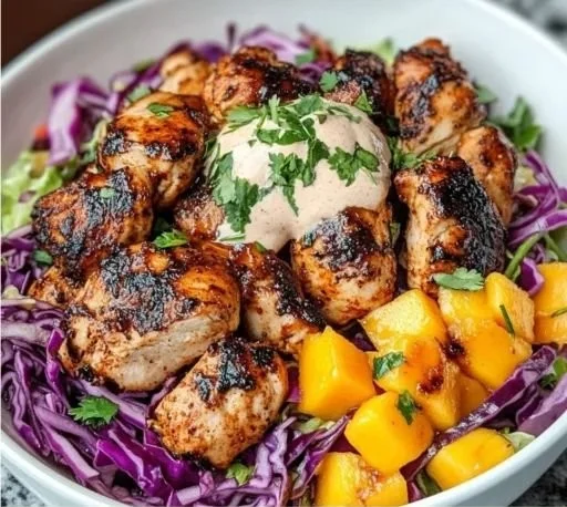 Jerk Chicken & Mango Slaw Bowls with Honey Lime Cream