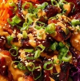 Delicious Korean BBQ Chicken Bowls served with rice and veggies for easy weeknight dinners.