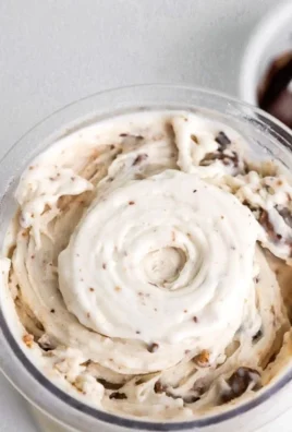 Moose Tracks Protein Ice Cream with chocolate and peanut butter swirls