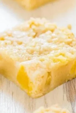 Delicious pineapple crumble bars with a buttery crumble topping