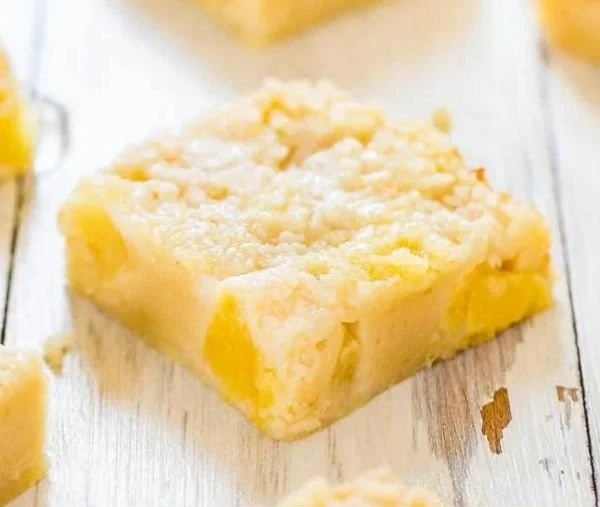 Delicious pineapple crumble bars with a buttery crumble topping