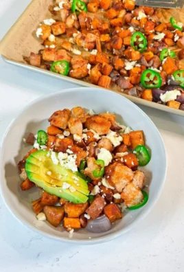 Sheet Pan Hot Honey Chicken with vibrant vegetables on a baking tray.