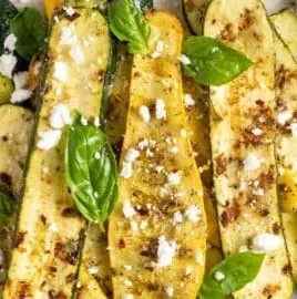 Delicious grilled zucchini and yellow squash served on a plate