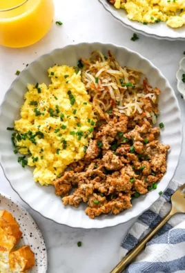 Delicious high protein breakfast bowl with eggs, quinoa, and fresh vegetables