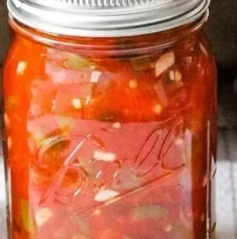 Homemade salsa in mason jars ready for canning
