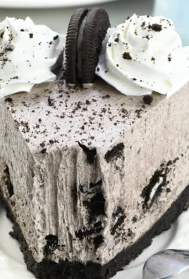 Delicious No-Bake Oreo Cheesecake topped with crushed Oreos