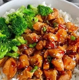 Delicious teriyaki chicken rice bowl with vegetables and sauce