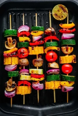Colorful veggie kabobs on skewers ready for grilling